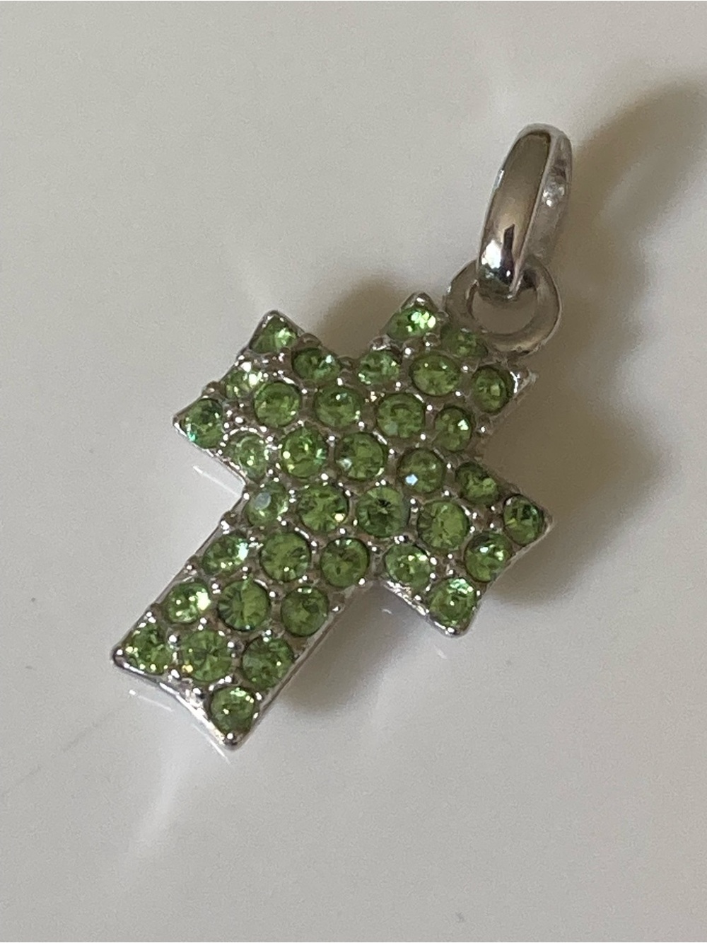 Swarovski green pave crystal rhodium plated silver tone cross pendant